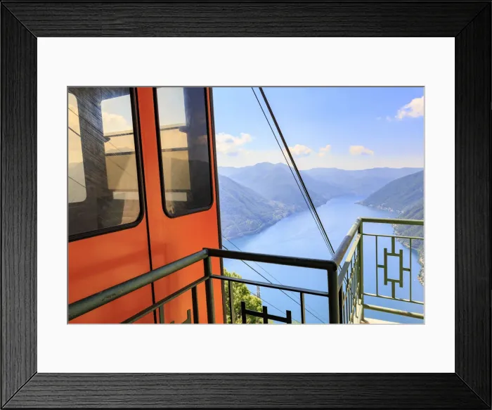 Framed Print : Pigra cable car in an elevated position above Como Lake. Pigra, Val d Intelvi Framed Print : Pigra cable car in an elevated position above Como Lake. Pigra, Val d Intelvi