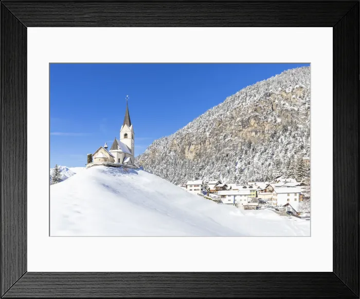 Framed Print : Typical church of Davos Wiesen after a snowfall. Landwasser Valley, Albula Valley Framed Print : Typical church of Davos Wiesen after a snowfall. Landwasser Valley, Albula Valley