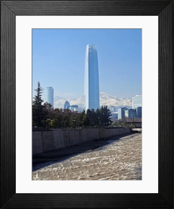 Framed Print : Chile, Santiago, View over Mapocho River towards the high raised buildings with Costanera