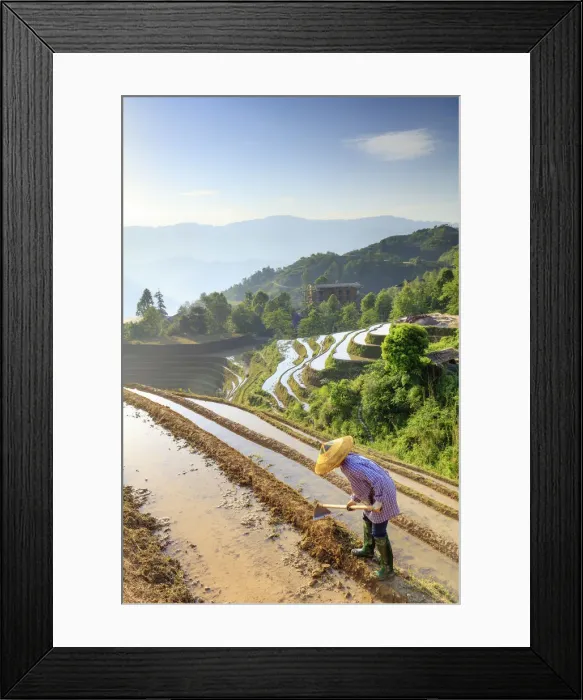 Framed Print : China, Guangxi Province, Longsheng, a farmer wearing a traditional hat working