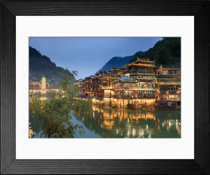 Framed Print : China, Hunan province, Fenghuang, riverside houses by night reflecting in the river Framed Print : China, Hunan province, Fenghuang, riverside houses by night reflecting in the river