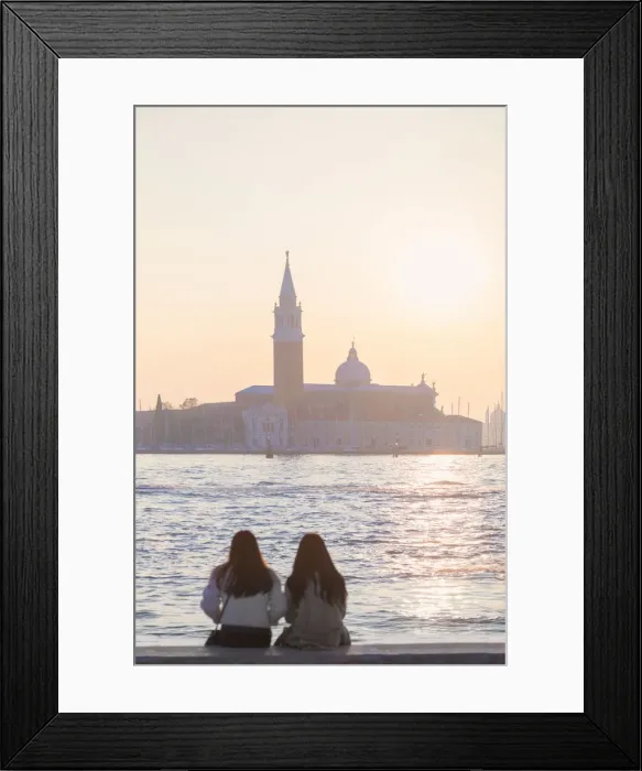 Framed Print : two tourists admire the sunset towards the island of San Giorgio maggiore from Framed Print : two tourists admire the sunset towards the island of San Giorgio maggiore from