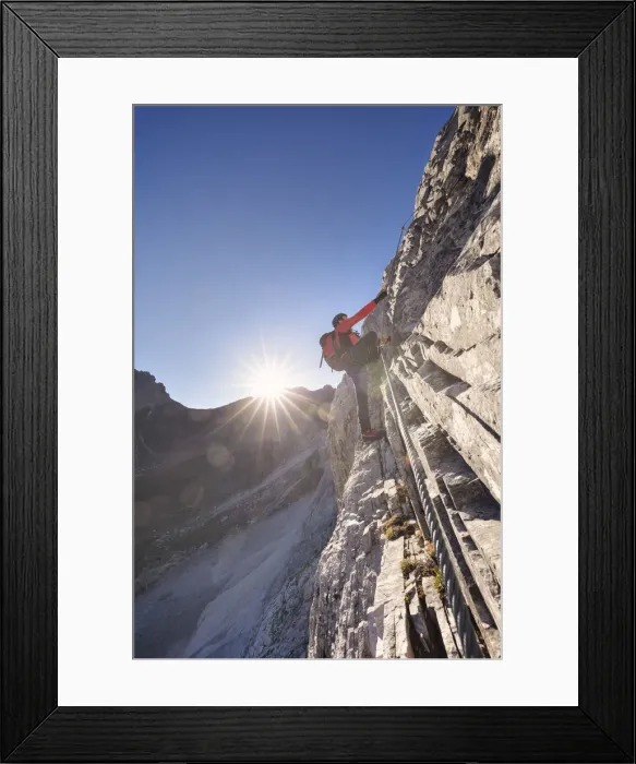 Framed Print : Mountaineer along the via ferrata on the north side of mount Gr. Kinigat, Kartitsch Framed Print : Mountaineer along the via ferrata on the north side of mount Gr. Kinigat, Kartitsch