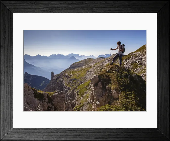 Framed Print : Hikers near Passo del Ciodo looking at the landscape, in the bottom the curious bell Framed Print : Hikers near Passo del Ciodo looking at the landscape, in the bottom the curious bell