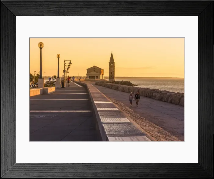 Framed Print : Europe, Italy, Veneto, Caorle. People walking at sunrise on the waterfront Framed Print : Europe, Italy, Veneto, Caorle. People walking at sunrise on the waterfront