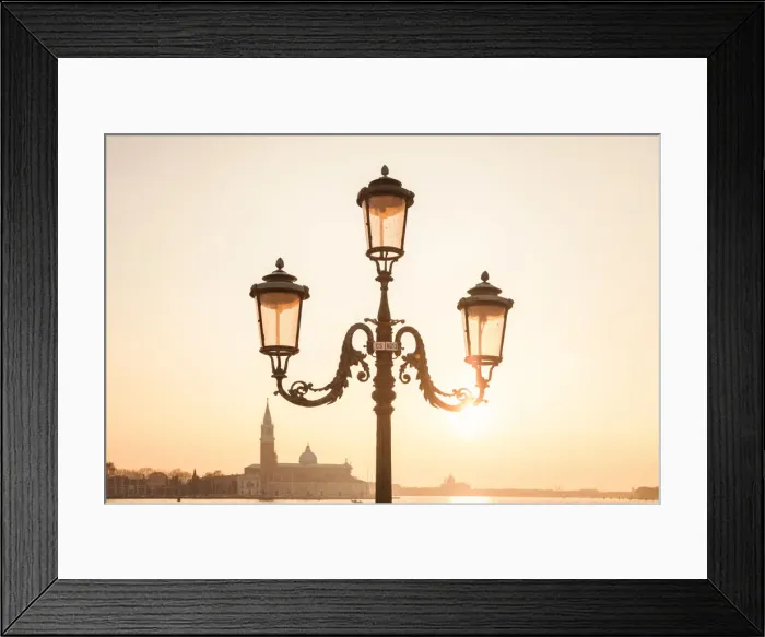 Framed Print : characteristic venetian lamp post in Riva degli Schiavoni, in the background the island Framed Print : characteristic venetian lamp post in Riva degli Schiavoni, in the background the island
