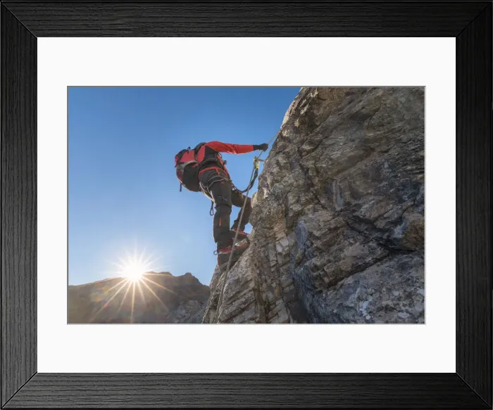 Framed Print : Mountaineer along the via ferrata on the north side of mount Gr. Kinigat, Kartitsch Framed Print : Mountaineer along the via ferrata on the north side of mount Gr. Kinigat, Kartitsch