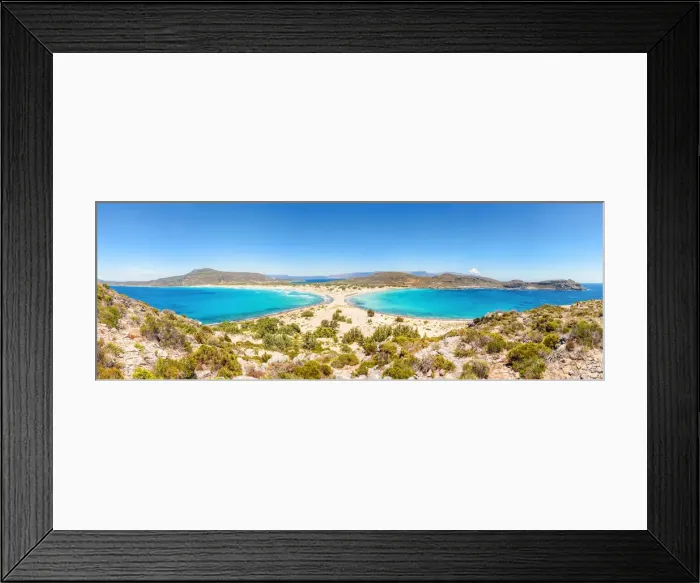 Framed Print : The narrow stretch of white sand which divides Simos beach viewed from a ridge Framed Print : The narrow stretch of white sand which divides Simos beach viewed from a ridge