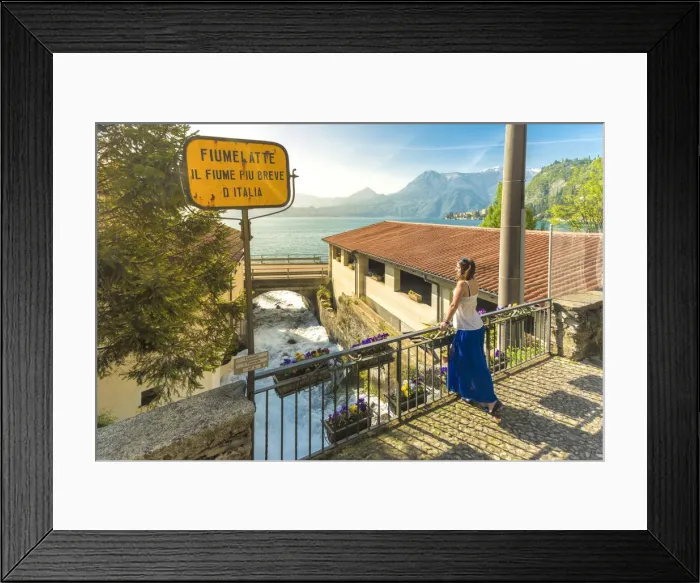 Framed Print : Woman admiring the short Fiumelatte river, Lake Como, Varenna, lecco Province, Lombardy Framed Print : Woman admiring the short Fiumelatte river, Lake Como, Varenna, lecco Province, Lombardy