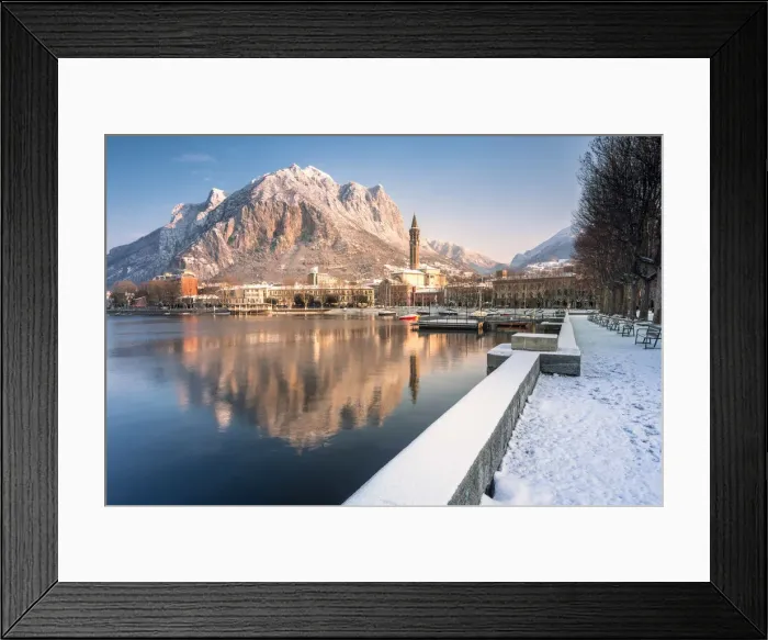 Framed Print : Snowy lakefront of Lecco and San Martino Mountain reflected in Como lake, Lecco province Framed Print : Snowy lakefront of Lecco and San Martino Mountain reflected in Como lake, Lecco province