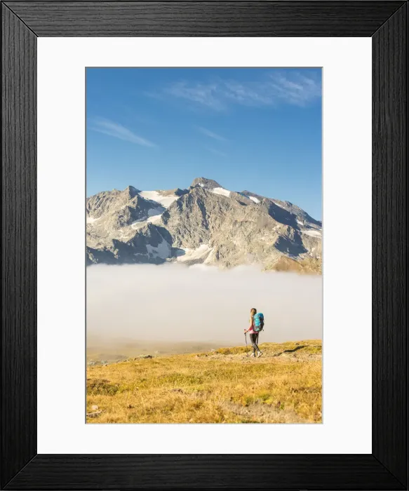 Framed Print : Young hiker walking along hill of Nivolet with Grand Aiguille Rousse in the background