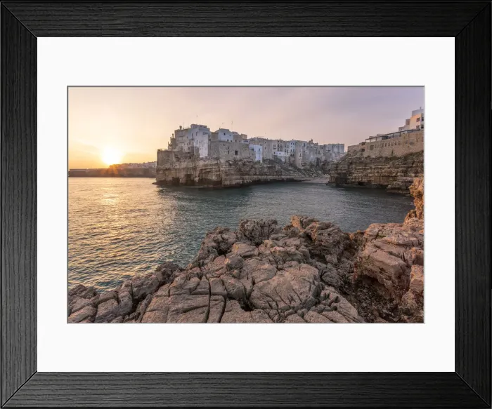 Framed Print : Old town of Polignano a Mare built on rocky cliffs at sunrise, Bari province, Apulia Framed Print : Old town of Polignano a Mare built on rocky cliffs at sunrise, Bari province, Apulia