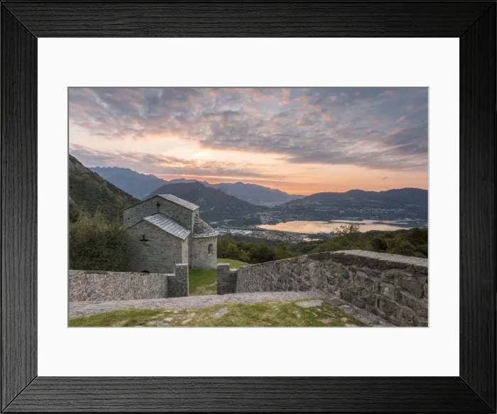 Framed Print : The abbey of San Pietro al Monte, an ancient monastic complex of Romanesque style Framed Print : The abbey of San Pietro al Monte, an ancient monastic complex of Romanesque style