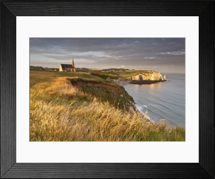 Framed Print : Etratat cliffs, Normandy, France. A small fishing village famous for the its spectacular Framed Print : Etratat cliffs, Normandy, France. A small fishing village famous for the its spectacular