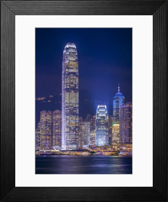 Framed Print : Hong Kong skyline, IFC Tower and skyscrapers on Hong Kong Island at night seen Framed Print : Hong Kong skyline, IFC Tower and skyscrapers on Hong Kong Island at night seen