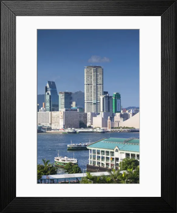 Framed Print : View of Tsim Sha Tsui skyline in Kowloon and Star Ferry pier, Hong Kong Framed Print : View of Tsim Sha Tsui skyline in Kowloon and Star Ferry pier, Hong Kong
