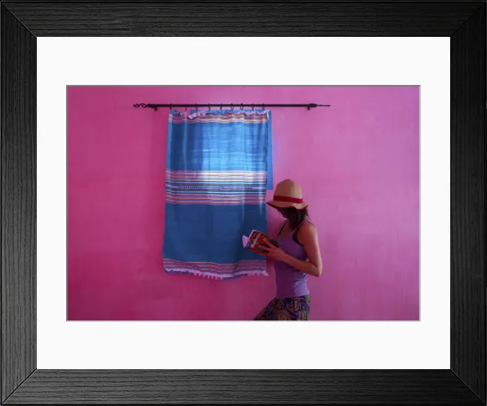 Framed Print : North Africa, Morocco, Meknes district. Girl reading a book by a window Framed Print : North Africa, Morocco, Meknes district. Girl reading a book by a window