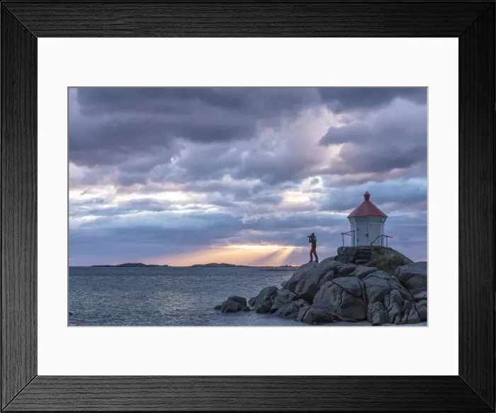 Framed Print : Photographer in action on cliffs while the midnight sun lights up the blue sea Eggum Vestvagoy Lofoten Islands Norway Europe Framed Print : Photographer in action on cliffs while the midnight sun lights up the blue sea Eggum Vestvagoy Lofoten Islands Norway Europe