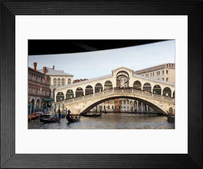 Framed Print : The Rialto Bridge is one of the four bridges spanning the Grand Canal in Venice