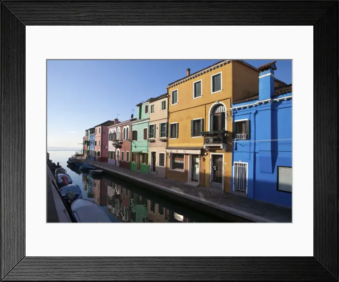 Framed Print : The typical Burano houses are mainly squared-shaped and are divided into two or three Framed Print : The typical Burano houses are mainly squared-shaped and are divided into two or three
