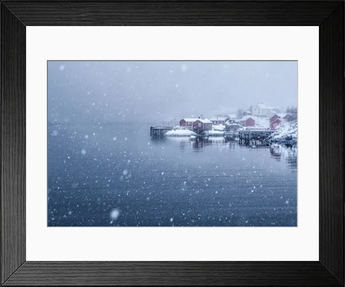 Framed Print : Heavy snowfall on the little village of Nusfjord. Lofoten islands. Norway Framed Print : Heavy snowfall on the little village of Nusfjord. Lofoten islands. Norway