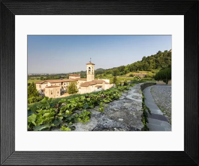 Framed Print : The ancient monastery of Astino surrounded by green hills, Longuelo, Province of Bergamo Framed Print : The ancient monastery of Astino surrounded by green hills, Longuelo, Province of Bergamo