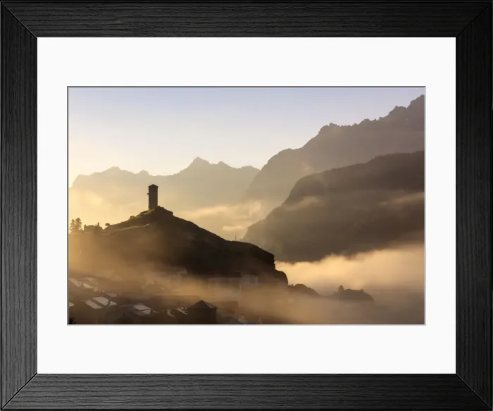 Framed Print : Tower of Steinsberg Castle shrouded by mist, Ardez, canton of GraubAonden, district Framed Print : Tower of Steinsberg Castle shrouded by mist, Ardez, canton of GraubAonden, district