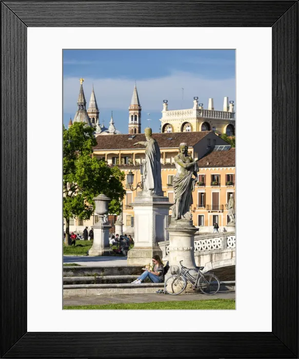 Framed Print : A girl reading in Prato della Valle, Padova, Veneto, Italy, Europe Framed Print : A girl reading in Prato della Valle, Padova, Veneto, Italy, Europe