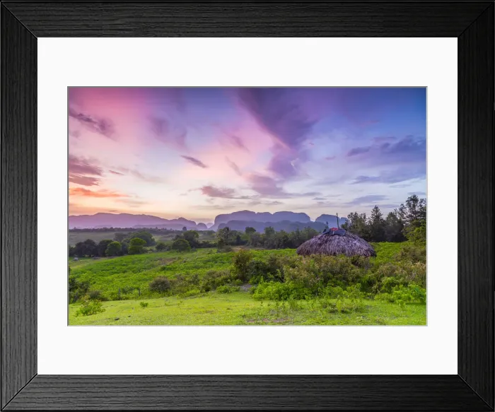 Framed Print : Sunset over the tobacco plantations and limestone hills (Mogotes) of the Vinales Valley