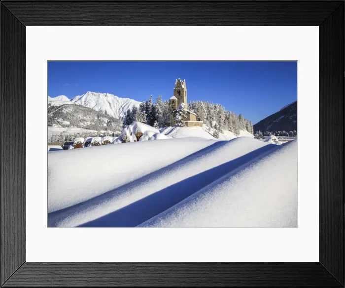 Framed Print : The church of San Gian surrounded by snow dunes. Celerina. Engadine. Canton of Graubunden Framed Print : The church of San Gian surrounded by snow dunes. Celerina. Engadine. Canton of Graubunden