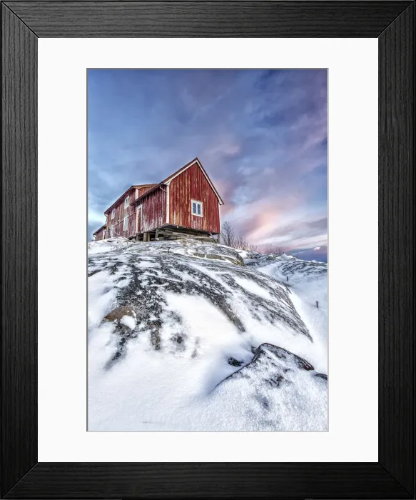 Framed Print : The colors of dawn light up the sky above a typical red house of Henningsvaer Framed Print : The colors of dawn light up the sky above a typical red house of Henningsvaer