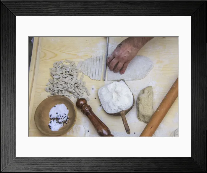 Framed Print : Cutting of the dough for the production of Pizzoccheri. Lombardy. Italy. Europe Framed Print : Cutting of the dough for the production of Pizzoccheri. Lombardy. Italy. Europe
