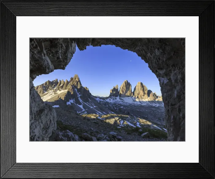 Framed Print : The Three Peaks of Lavaredo seen from a cave