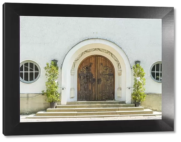 Wolfratshausen, Upper Bavaria, Germany. Entrance portal to the evangelical church of St