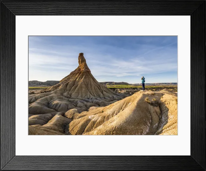 Framed Print : A tourist admiring Castildetierra at sunset