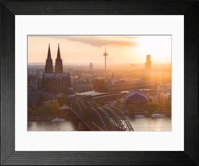 Framed Print : Cologne Cathedral at sunset and Hohenzoller Bridge over River Rhine in Cologne city
