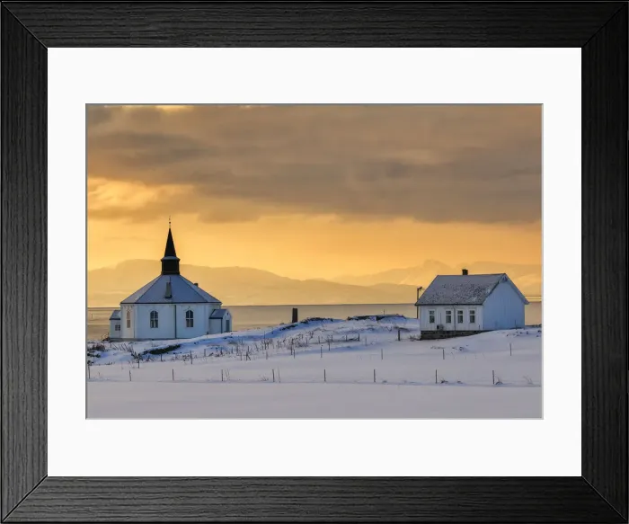 Framed Print : The white wooden octagonal church of Dverberg in the cold morning snowy landscape Framed Print : The white wooden octagonal church of Dverberg in the cold morning snowy landscape