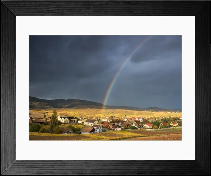 Framed Print : Golden light and rainbow over Hunawihr surrounded by the vineyards of Grand Cru in Alsace Framed Print : Golden light and rainbow over Hunawihr surrounded by the vineyards of Grand Cru in Alsace