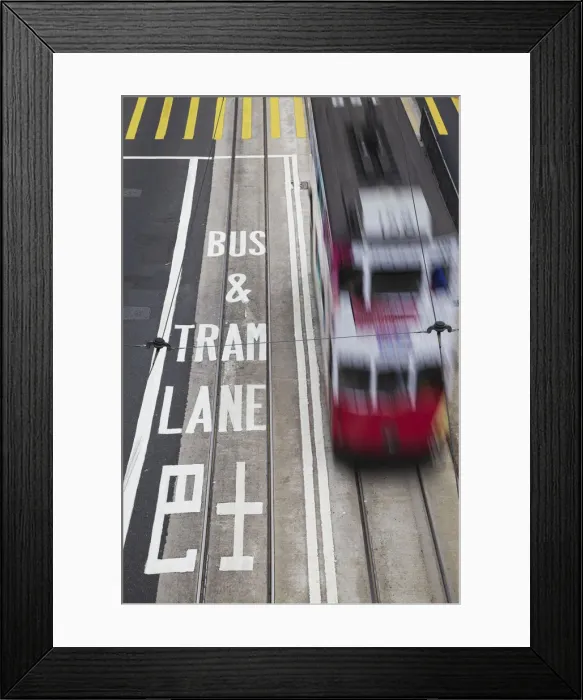Framed Print : Tram passing along Des Voeux Road Central, Central, Hong Kong, China Framed Print : Tram passing along Des Voeux Road Central, Central, Hong Kong, China