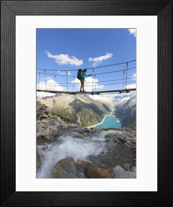 Framed Print : The tibetan bridge near Olperer refuge with Lake Schlegeispeicher on the background Framed Print : The tibetan bridge near Olperer refuge with Lake Schlegeispeicher on the background