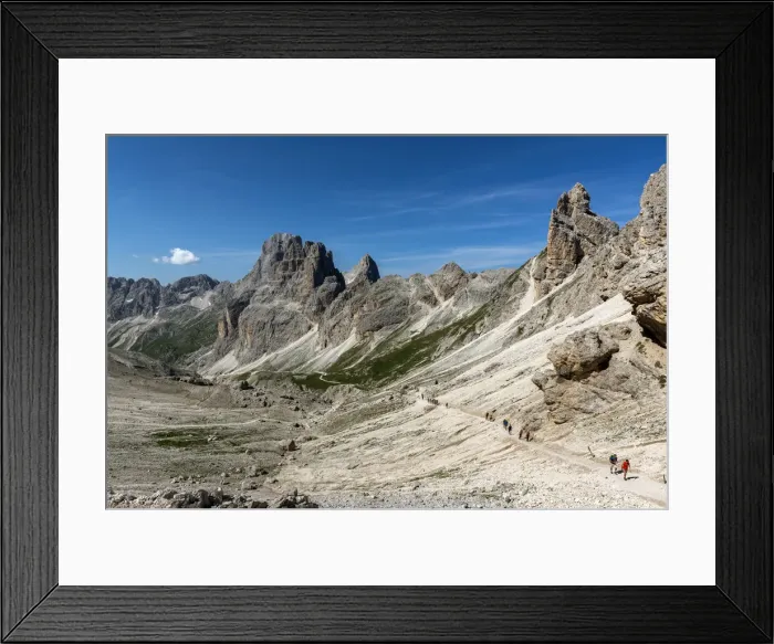 Framed Print : A group of hikers in the Vajolet Valley with the peaks of the Catinaccio group, Dolomites Framed Print : A group of hikers in the Vajolet Valley with the peaks of the Catinaccio group, Dolomites