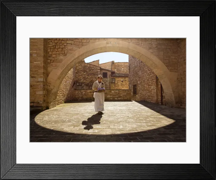 Framed Print : Europe, Italy, Umbria, Perugia district, Spello. Woman walking in the old city Framed Print : Europe, Italy, Umbria, Perugia district, Spello. Woman walking in the old city