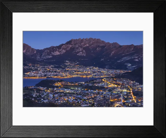 Framed Print : Lecco lights up at dusk from the Plain of San Tomaso, lake Como, Lombardy, Italy, Europe Framed Print : Lecco lights up at dusk from the Plain of San Tomaso, lake Como, Lombardy, Italy, Europe