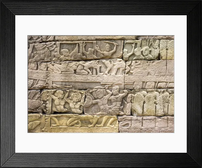 Framed Print : Bas-relief stone carvings depicting battle, Banteay Chhmar, Ankorian-era temple ruins Framed Print : Bas-relief stone carvings depicting battle, Banteay Chhmar, Ankorian-era temple ruins