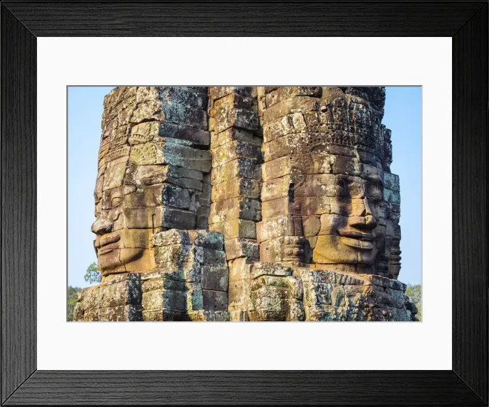 Framed Print : Carved stone faces at Prasat Bayon temple ruins, Angkor Thom, UNESCO World Heritage Site Framed Print : Carved stone faces at Prasat Bayon temple ruins, Angkor Thom, UNESCO World Heritage Site