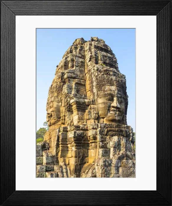 Framed Print : Carved stone faces at Prasat Bayon temple ruins, Angkor Thom, UNESCO World Heritage Site Framed Print : Carved stone faces at Prasat Bayon temple ruins, Angkor Thom, UNESCO World Heritage Site