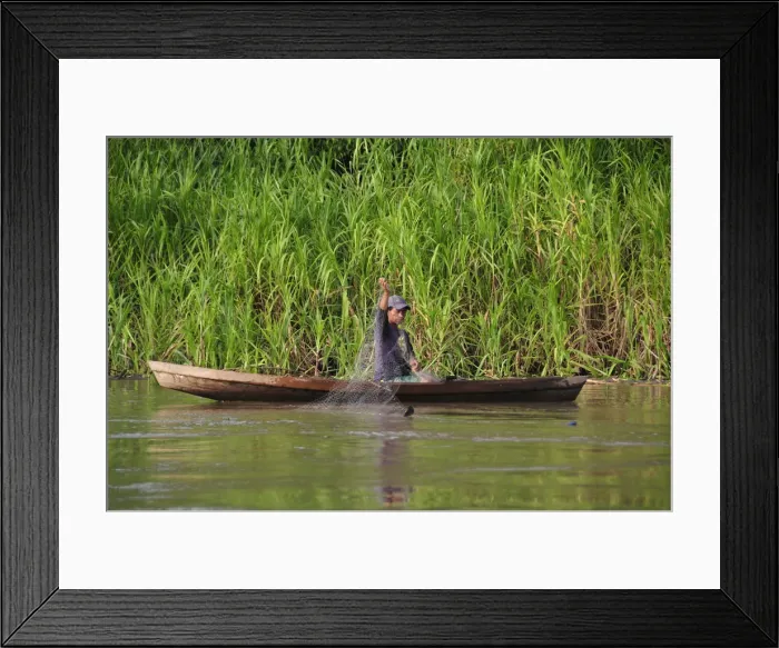 Framed Print : Man fishing on the Amazon River, near Puerto Narino, Colombia Framed Print : Man fishing on the Amazon River, near Puerto Narino, Colombia