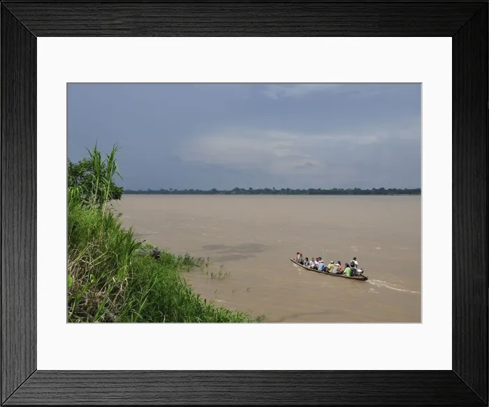 Framed Print : A small boat on the Amazon River, near Puerto Narino, Colombia Framed Print : A small boat on the Amazon River, near Puerto Narino, Colombia