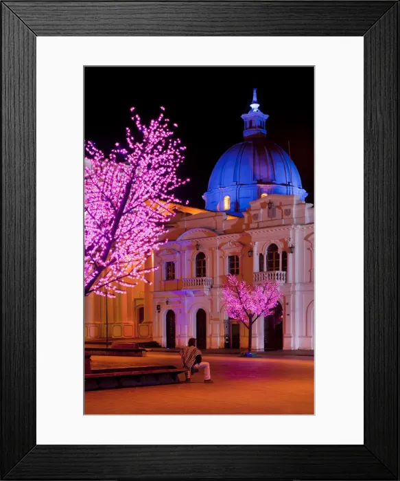 Framed Print : Man sitting on a bench at Plaza Caldas, Popayan, Colombia, South America MR