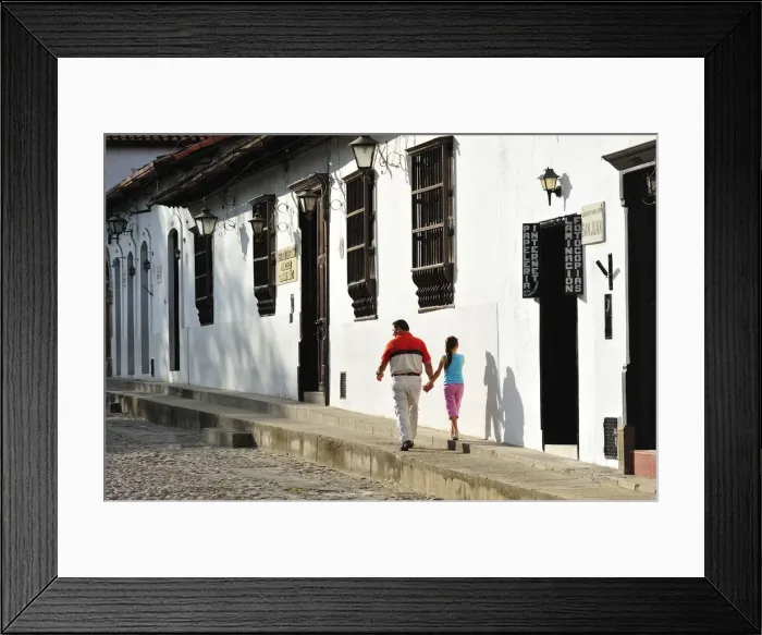 Framed Print : Father and daughter walking in the Colonial town of Giron, Colombia, South America